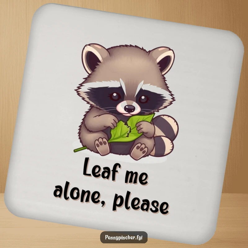 Funny drink coaster featuring a clever raccoon meticulously mending a tiny torn leaf, keeping surfaces safe.