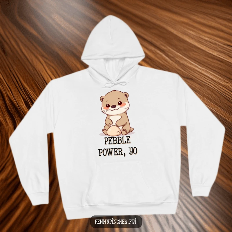 Funny otter hoodie, a cheerful character holding a small smooth pebble, warm and humorous apparel for comfort.