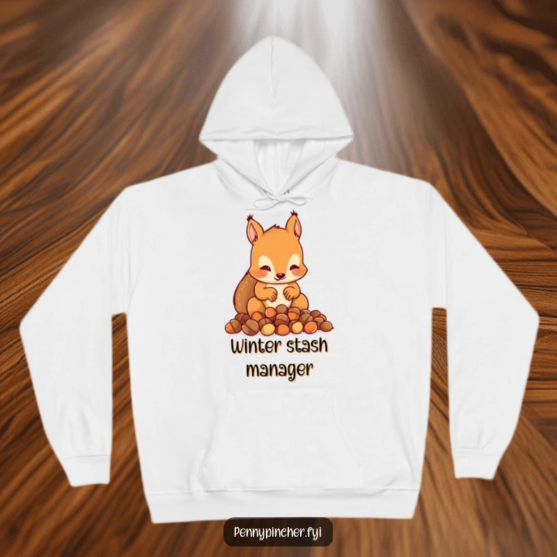 Funny hoodie depicting a squirrel character meticulously counting a small pile of acorns, looking very engrossed.