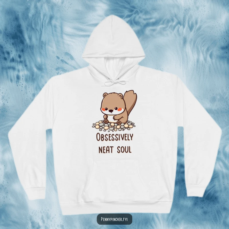 Funny Kawaii beaver hoodie showing a character meticulously arranging tiny pebbles, designed for comfort and a touch of humorous organization.