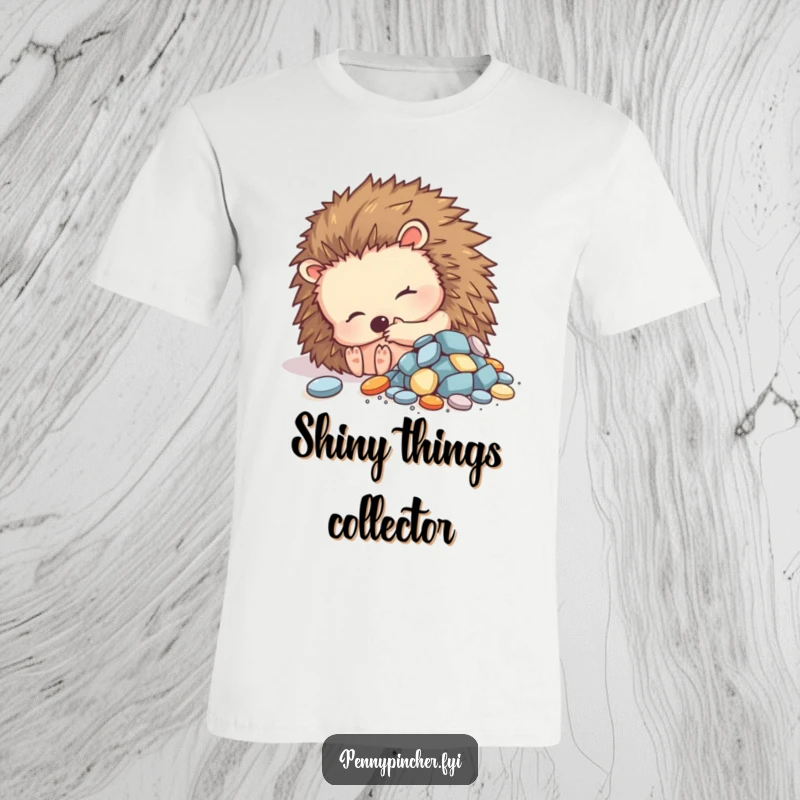 Funny t-shirt depicting a contented hedgehog curled up with a pile of shiny objects, representing joy in possessions.